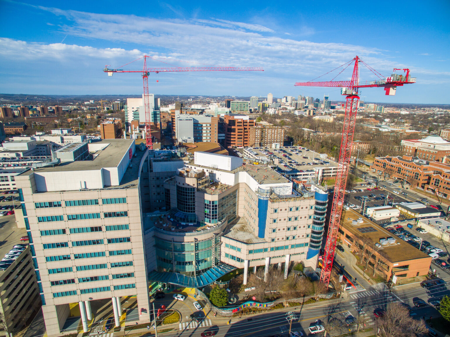 Aerial photos of the expansion construction at Monroe Carell Jr. Children’s Hospital at Vanderbilt. Two cranes were set up to build four floors atop the existing Monroe Carell facility. (photo by John Russell)