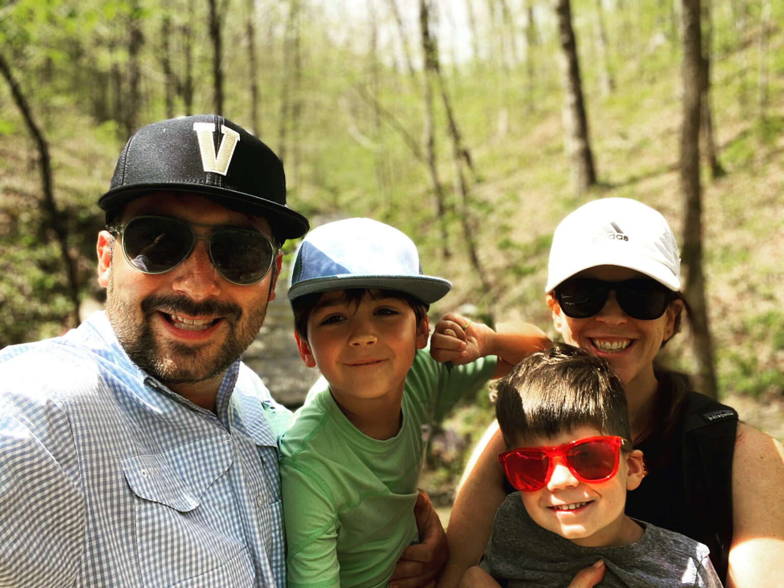 David and Emma Anderson with their sons, Henry (green shirt) and Leo.