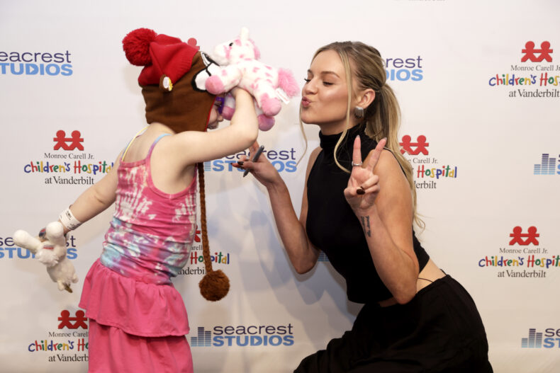 Country music star Kelsea Ballerini talks with patients during her visit to Monroe Carell Jr. Children’s Hospital at Vanderbilt. (photo by Donn Jones)
