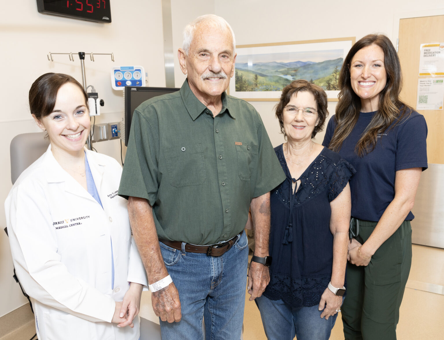 Bladder cancer patient Patrick Delahoussaye and his wife, Roxanne, with Amy Luckenbaugh, MD, left, and Bree Duncan, BSN, RN, right. (photo by Erin O. Smith)