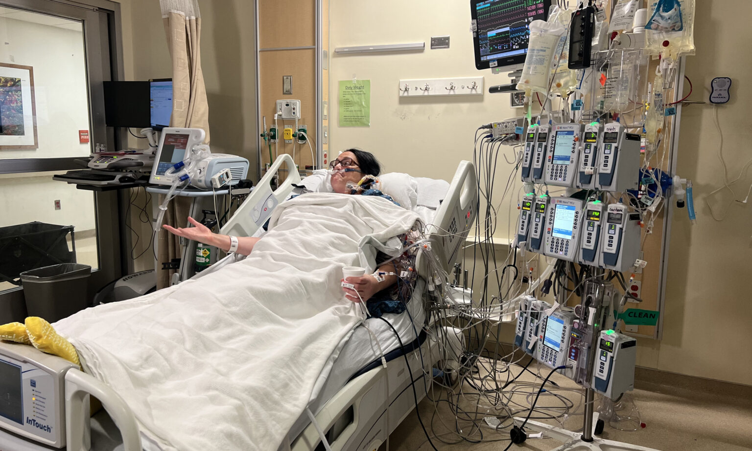 Melissia Boynton speaks with a visitor a few days after her heart transplant. (photo by Kylie Avery)
