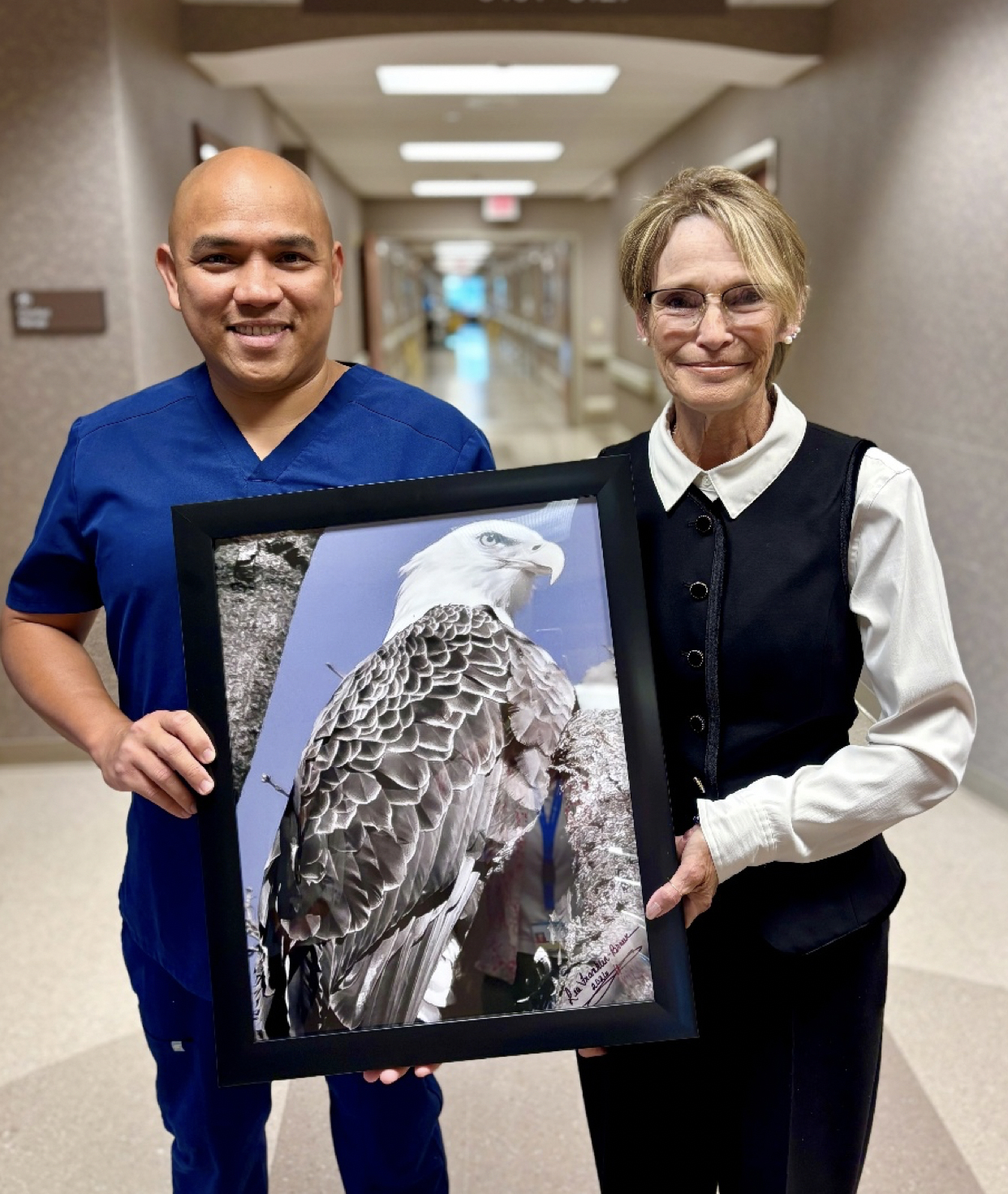 Ervin Nepomuceno, RN, and patient Lea Braun.