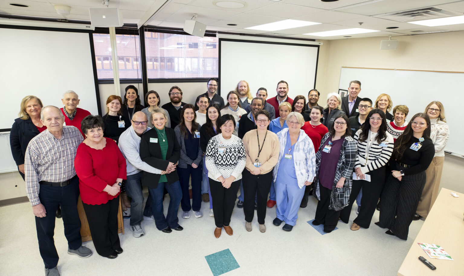 Former Vanderbilt University Hospital patients who had long recoveries at the Nashville medical facility reconnect with the care teams who helped them regain their health. (photo by Susan Urmy)