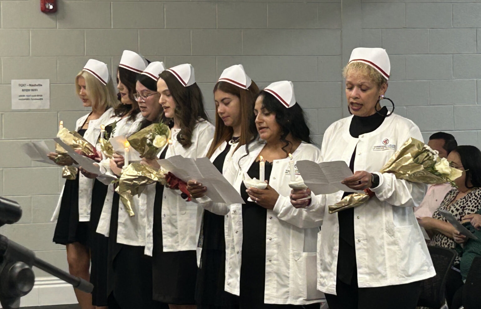 From left are program graduates Sophia Gorrell, Sarah Jackson, Melanie Maldonado, Britanny Newman, Danley Rodriguez, Luz Maria Rodriguez and Nakia Wiliams.