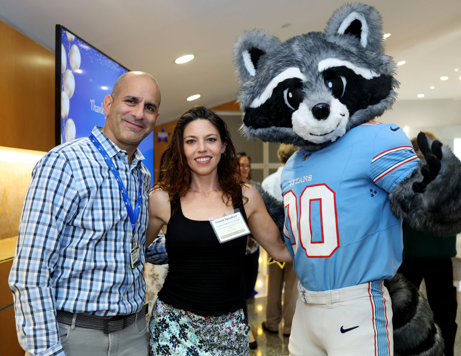 John Thomas, MD, left, with guest speaker and Patient and Family Advisory Council member Natalie-Chantel Levy-Sousan, and Tennessee Titans mascot T-Rac at the Making Safety Personal Celebration. (photo by Donn Jones)