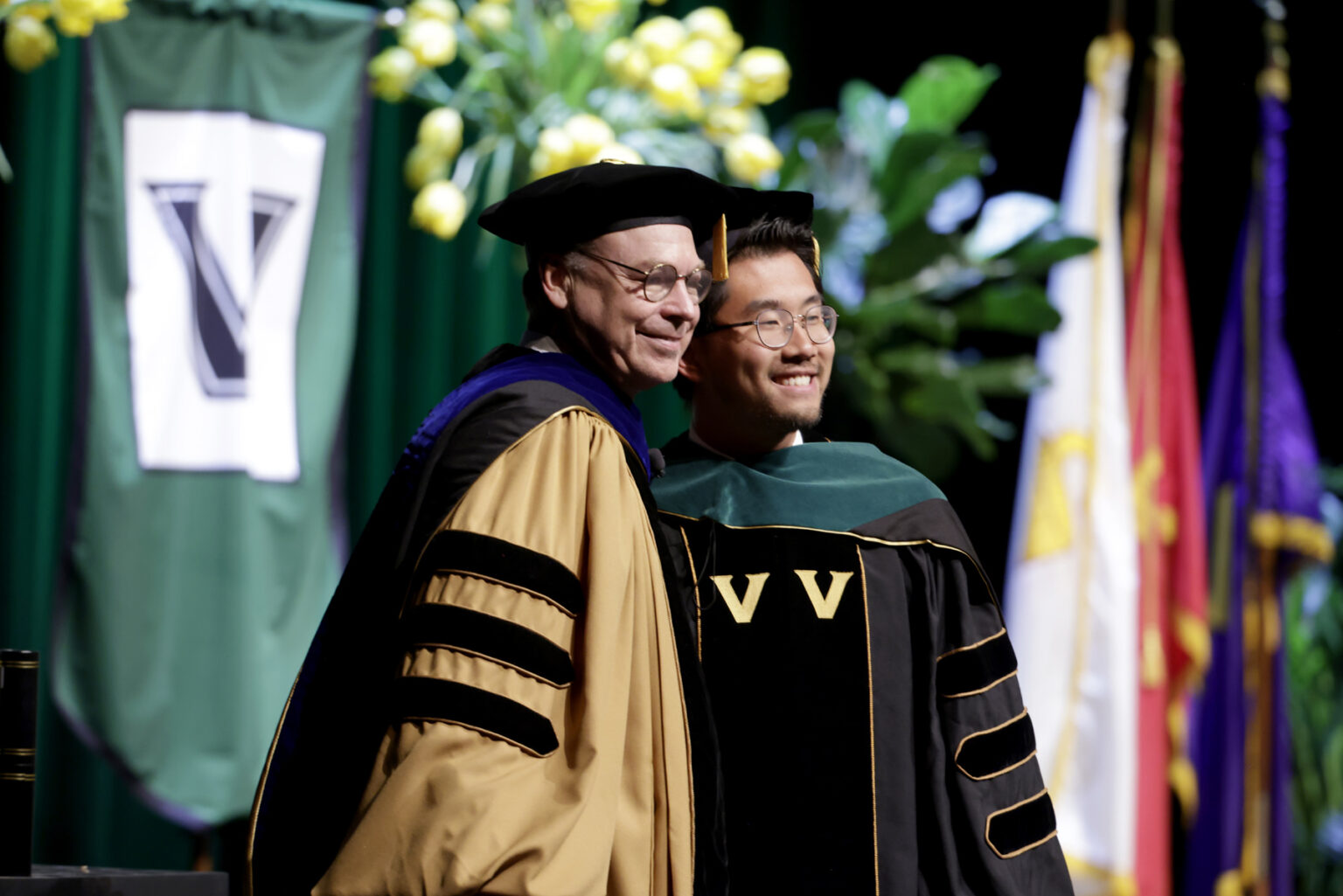 Brian Hou, MD, right, poses for a photo with Jeff Balser, MD, PhD. (photo by Donn Jones)