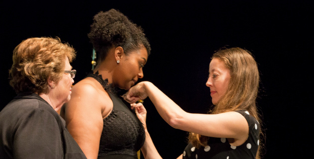 School of Nursing Dean Linda Norman (far left) and Assistant Professor Brittany Nelson (far right) at the August 2017 pinning ceremony in Langford Auditorium. (Vanderbilt University)
