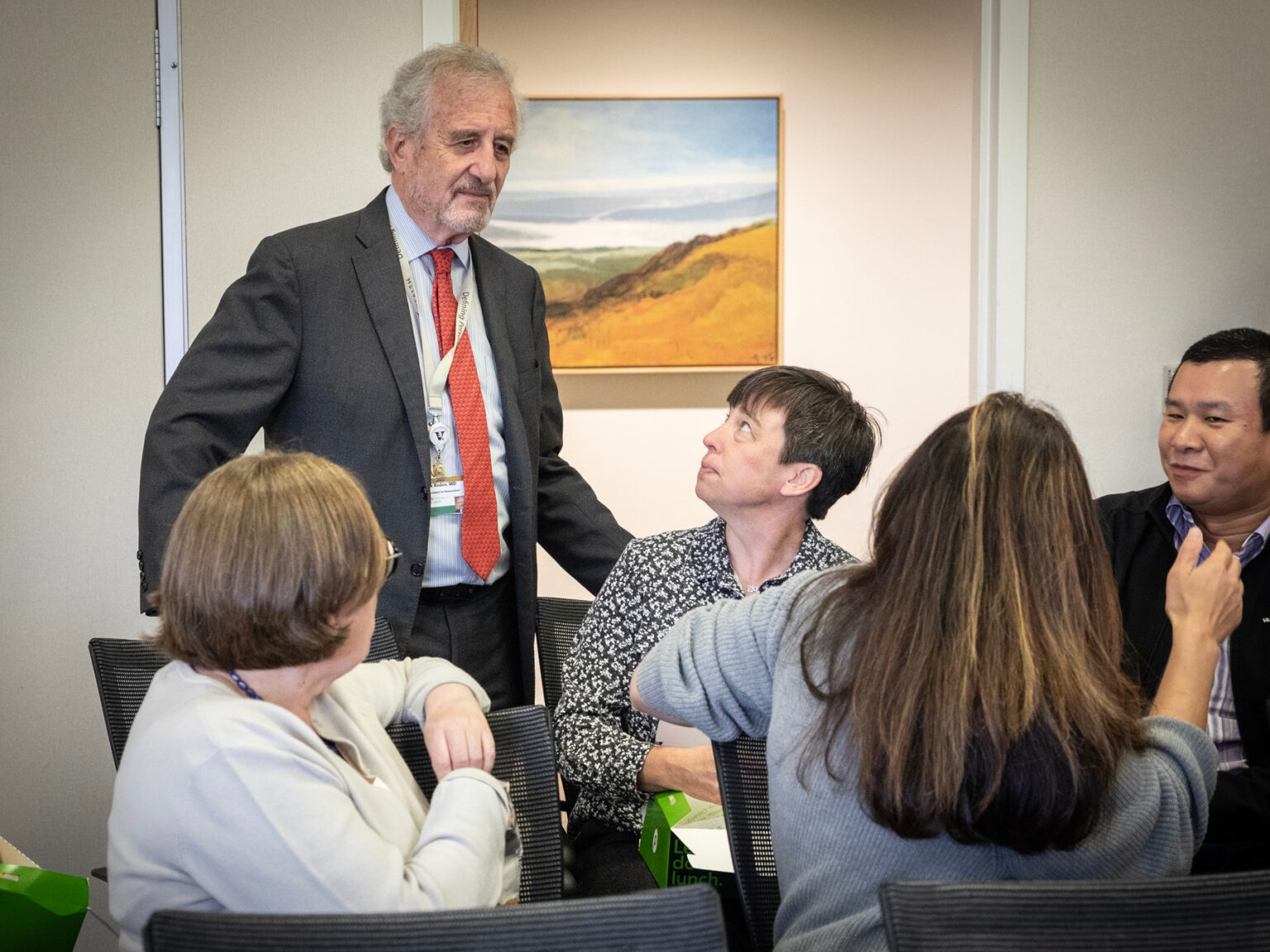 Dan Roden, MD, chats with colleagues during a break in the symposium. (photo by Erin O. Smith)