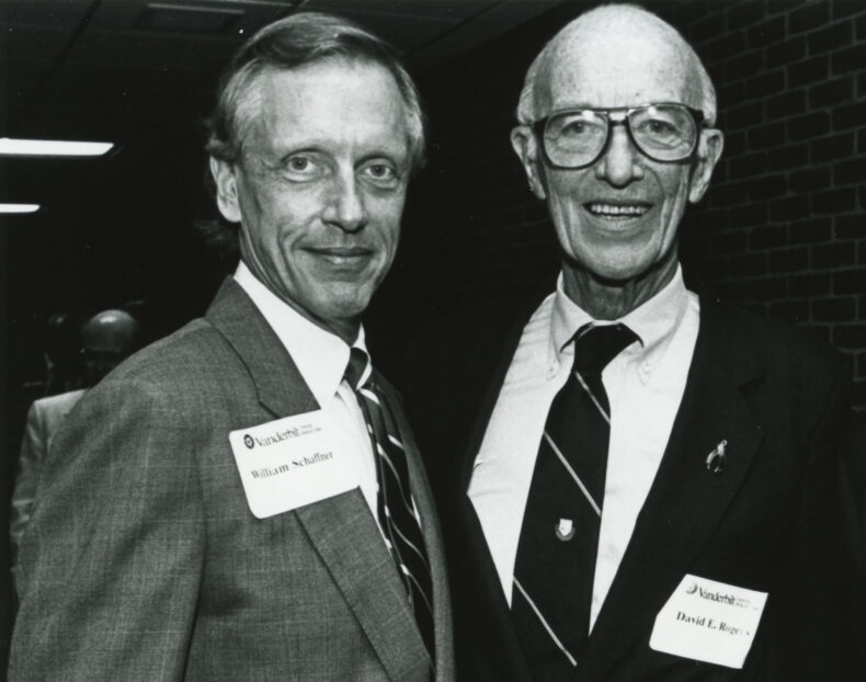 William Schaffner, MD, left, and David E. Rogers, MD, at a celebration in Rogers' honor in May 1994. (photo by John Howser)