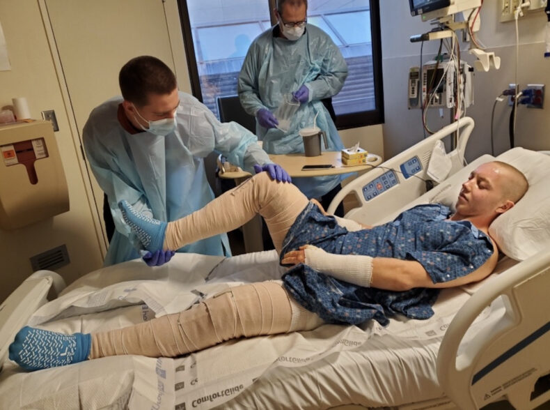 Compassionate care met determination as burn patient Sean Smith worked toward recovery.