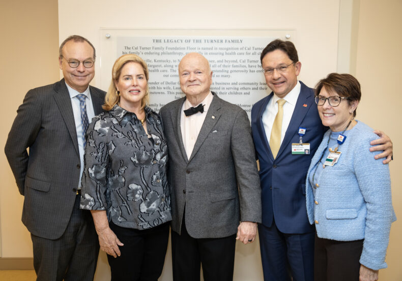 From left are, Jeff Balser, MD, PhD, Kathryn Carell Brown, Cal Turner; Juan C. Salazar, MD, MPH, and Meg Rush, MD, MMHC, pose for a photo together during the Cal Turner Naming Unveiling Event held on the 12th floor of Monroe Carell Jr. Children’s Hospital at Vanderbilt. (photo by Erin O. Smith)