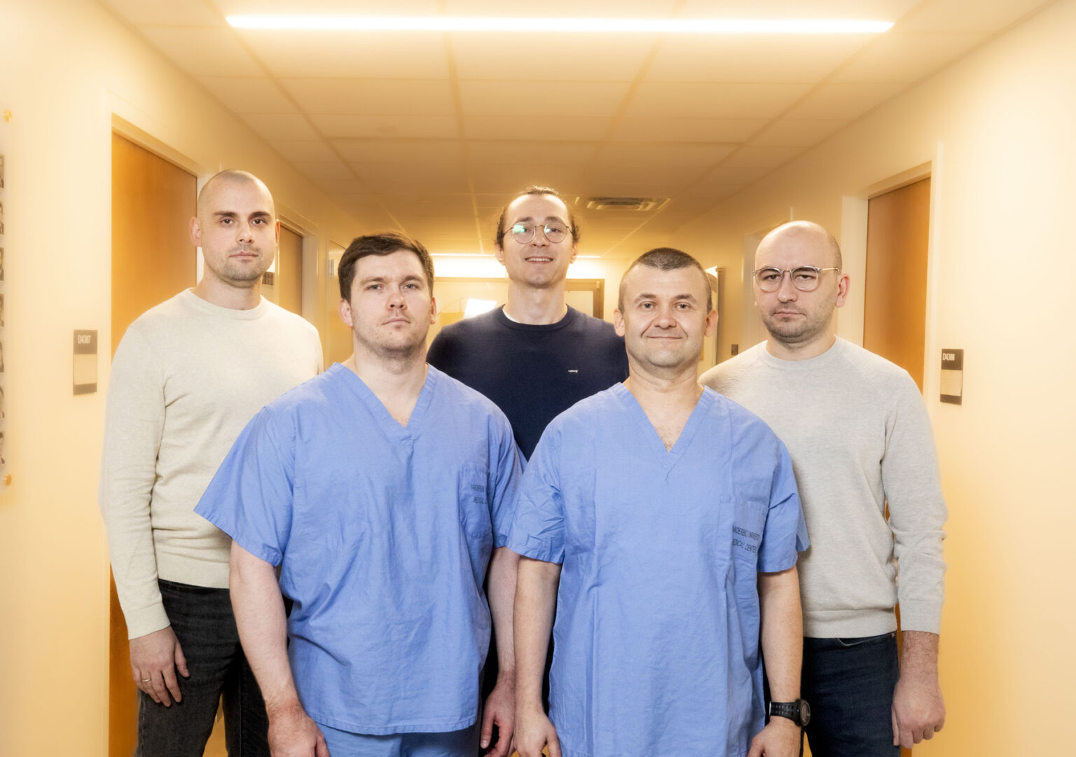 The team from Ukraine included (front row, from left) Yevhen Haidarzhi, MD, PhD, Andrii Zhylenko, MD, (back row, from left) Oleksandr Dubnevych, MD, Illia Yeremieiev, MD, and Vlad Kropelnytskyi, MD. (photo by Susan Urmy)