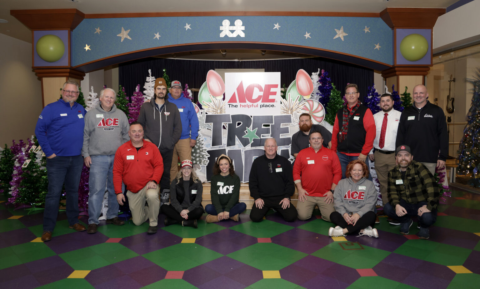 Officials with Ace Hardware gather for a photo during the event. (photo by Donn Jones)