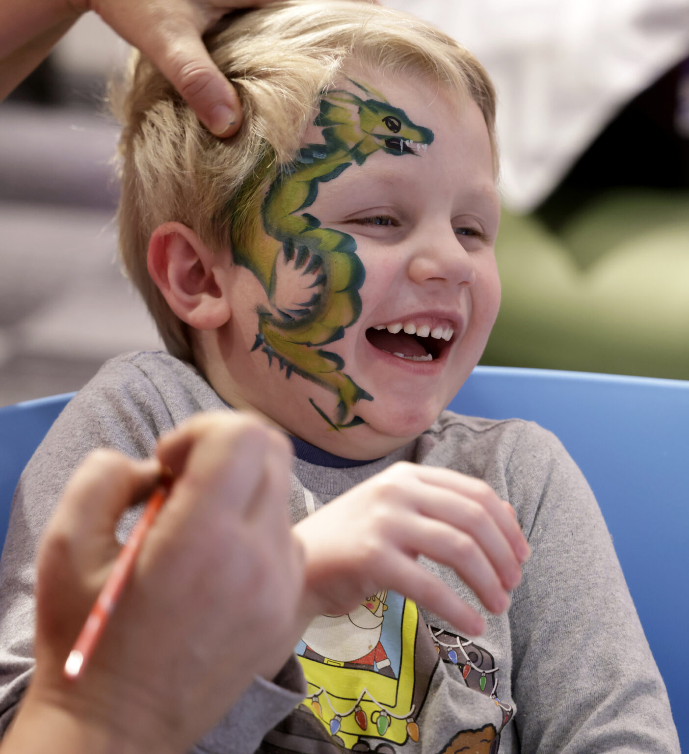 Jackson Ferguson, 5, gets his face painted. (photo by Donn Jones)