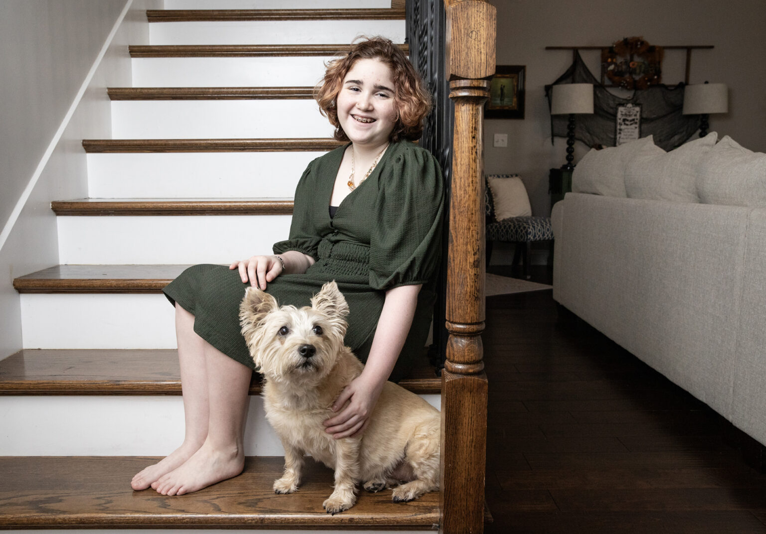 Maddie Wright with her service dog, Quip. (photo by Erin O. Smith)