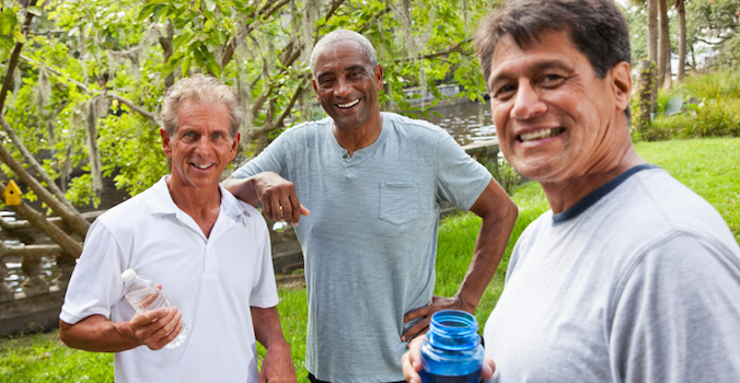 ethnically diverse senior men being active
