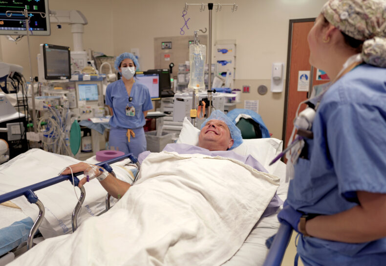 Aaron Davis arrives in the operating room for Vanderbilt Health's 100th histotripsy procedure. (photo by Donn Jones)