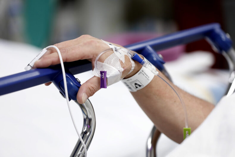 Though the procedure is non-invasive, patients are sedated and receive intravenous treatments. (photo by Donn Jones)